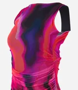 Vestido midi sin mangas confeccionado en tul con estampado abstracto y lazo en la espalda.