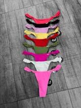 Bombacha colaless de lycra en colores rosa, blanco, fucsia, verde militar, rojo, amarillo, lila, negro y coral, con voladitos en los laterales.