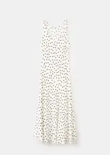 Vestido midi de viscosa fluida en color crudo con estampado de lunares negros, de corte recto, escote redondo, tirantes y bajo asimétrico.