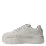 Championes blancos de plataforma con cordones.