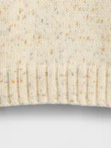 Buzo de punto de algodón con cuello redondo, mangas largas con hombros caídos y puños y ruedo acanalados. Diseño de corte holgado.