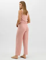 Pantalón tejido de corte recto y diseño fluido, color amarillo, con cintura ancha elastizada.