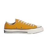 Championes Converse Chuck 70 Ox color amarillo con cordones blancos y suela de goma blanca.