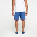 Short de fútbol Umbro del Club Nacional de Football, modelo Away 2. Diseño en color azul con detalles rojos en los bordes inferiores, escudo del club y logo de la marca.