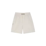 Short de descanso estilo bóxer de cuadros vichy en tonos beige y blanco, con cintura elástica y cierre frontal con botones.