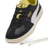 Championes Puma Ferrari Palermo, color negro con detalles en blanco y amarillo.