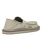 Zapatos tipo slip-on Sanuk modelo Donny Hemp, color beige, con diseño de talón plegable y bordes deshilachados. Presentan capellada de cáñamo y algodón, forro interior con estampado tipo manta y suela de goma con entresuela de EVA.