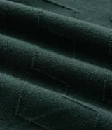 Suéter de punto verde oscuro con cuello redondo y diseño texturizado en zigzag.