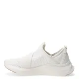 Championes Puma Softride Harmony Slip color blanco con detalles en marrón en la puntera y logo de la marca en negro.