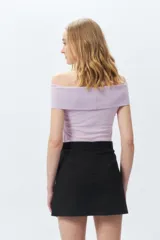 Top strapless negro con efecto desteñido.