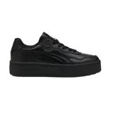 Championes Puma modelo Court Lally Skye, de diseño urbano con plataforma, color negro monocromático, confeccionados en material sintético con cordones al tono y logo de la marca en el lateral.