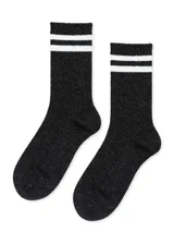 Medias de caña media color negro con lurex plateado y dos rayas horizontales blancas en el borde superior.