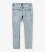 Pantalón de jean skinny celeste con efecto marmolado y lavado dirty.