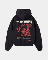 Canguro negro con capucha y bolsillo frontal, confeccionado en tejido de algodón y poliéster con interior de felpa. Presenta un estampado gráfico en la espalda en color rojo y crema con motivos de cadenas y una mano alzada, junto con una lista de canciones y el logo de la marca.