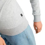 Buzo Puma de mujer color gris con logo estampado en el frente, cuello redondo y mangas largas.