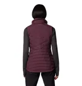 Chaleco acolchado Columbia con tecnología Omni-Shield que repele la humedad y aislamiento térmico sintético. Presenta cierre frontal completo, cuello alto forrado, bolsillos laterales con cremallera y logo de la marca bordado en el pecho.