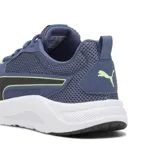 Championes deportivos Puma FTR Connect, color azul con detalles en negro y verde neón. Presentan una parte superior de malla transpirable, entresuela blanca amortiguada y suela de goma resistente.