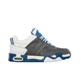 Championes de skate éS modelo Evant x Tiribo, con diseño robusto en combinación de colores azul, gris y blanco. Presentan paneles de gamuza gris, detalles en cuero blanco y una suela técnica con unidad de aire visible en el talón.