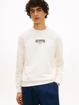 Buzo Tommy Hilfiger de cuello redondo en color blanco, con logo bordado en el pecho.