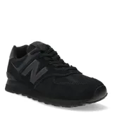 Championes urbanos New Balance modelo 574, color negro. Presentan una construcción en gamuza y malla, con el logo N característico en los laterales y entresuela con tecnología ENCAP para mayor amortiguación.