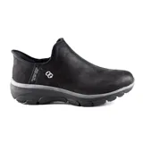 Botín negro Skechers Hands Free Slip-ins Relaxed Fit: Easy Going - Modern Hour, con capellada de cuero vegano tratado con 3M Scotchgard, forro de piel sintética, plantilla Skechers Air-Cooled Memory Foam y Heel Pillow.