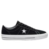 Championes Converse One Star Pro Ox de gamuza negra con estrella blanca en el lateral y suela de goma blanca.