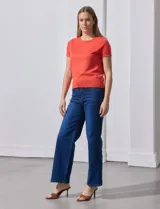 Buzo tejido en hilado fino color naranja, marca Ninety.