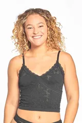 Bralette negro de encaje con jacquard, breteles finos y escote en V con borde de encaje.