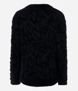 Suéter negro de poliamida con textura animal print y pelitos artificiales.