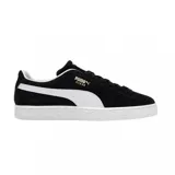 Championes Puma Suede Classic de gamuza negra con la icónica franja lateral blanca y suela de goma blanca.
