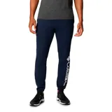 Pantalon tipo jogger de color azul marino, con cintura elástica y puños ajustados en los tobillos. Presenta el logo de la marca estampado en vertical sobre la pierna izquierda.