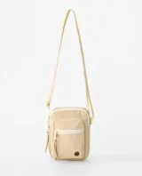 Morral Rip Curl Everyday Mini X Body de color natural, con bolsillo frontal con cierre, tira ajustable y detalles de la marca.