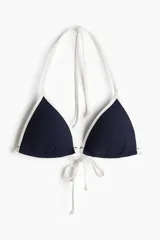 Top de bikini de triángulo con push-up, diseño texturizado en color azul marino con bordes y tiras blancas.