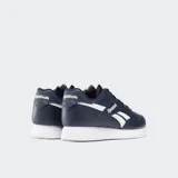 Championes Reebok modelo Jogger Lite, color azul marino con detalles en blanco. Diseño clásico con cordones y suela de goma.