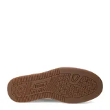 Championes urbanos Puma Caven 2.0, color blanco, con diseño clásico de corte bajo, perforaciones en la puntera y logo de la marca en el lateral.