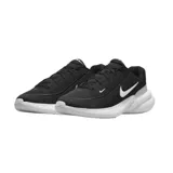 Championes Nike Uplift SC, color negro con detalles en blanco y gris. Presentan una parte superior de textil transpirable, entresuela de espuma para amortiguación y suela de goma para tracción.