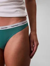Colaless Calvin Klein de algodón elástico color verde esmeralda, con cintura elástica blanca con logo de la marca.