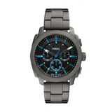 Reloj Fossil Machine con caja de acero plateado de 42mm y esfera negra con detalles en azul. Cuenta con pulsera de acero inoxidable plateado y subesferas de cronógrafo. Resistencia al agua de 5 ATM.
