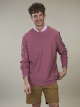 Buzo de tejido fleece color azul piedra, con cuello redondo y puños y ruedo acanalados.