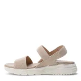 Sandalias de plataforma con tiras elásticas texturizadas en color beige. Presentan una base ergonómica de goma blanca con diseño estriado y plantilla acolchada al tono.