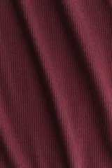 Pantalón deportivo de punto acanalado con cintura ancha plegable y diseño de piernas acampanadas.