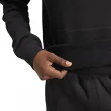 Buzo hoodie Adidas negro con logo trifolio blanco bordado en el pecho y bolsillo tipo canguro.