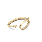 Pulsera rígida dorada con forma de grillete, con cierre de muelle interior.