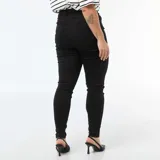 Pantalón skinny de tiro muy alto en color negro, con cierre frontal de botones a la vista y ajuste ceñido.