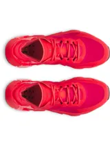 Championes de entrenamiento Under Armour modelo Halo Trainer, color rojo vibrante. Presentan un diseño técnico con amortiguación UA HOVR reactiva, estabilizador de tobillo, contrafuerte externo en el talón y suela de goma con ranuras de flexión para mayor tracción.