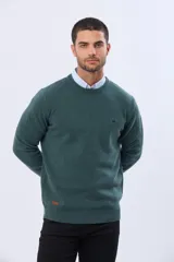 Buzo de lana azul con cuello redondo, manga larga y diseño tejido de punto.