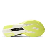 Championes de running New Balance FuelCell SC Elite V6, color amarillo flúor y blanco con detalles en azul marino y gris. Diseñados con entresuela ultralensible de PEBA, placa de fibra de carbono y parte superior de malla transpirable con tecnología FantomFit.