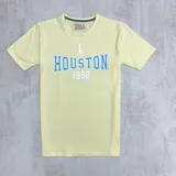 Remera amarilla de algodón con estampa azul de la palabra "Houston" y el número 1982.