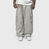 Pantalón cargo de jean color hueso, de corte ultra baggy con bolsillos laterales en las piernas.