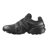 Championes de trail running Salomon Speedcross 6 Gore-Tex edición limitada 20 Years, color negro con detalles plateados y rojos. Cuenta con suela Contagrip, tecnología Gore-Tex impermeable y sistema de ajuste rápido Quicklace.